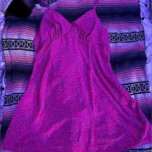 Lightly used spaghetti strap dress. Floral print, zip-up.